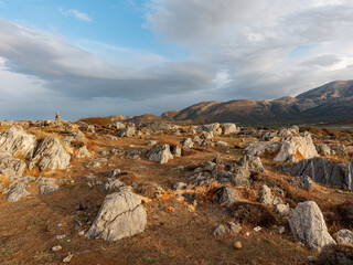 Sunset over Malia's stunning rocky landscape