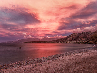 Fototapeta premium Sunset over tranquil Agios Nikolaos