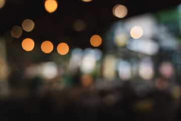 Blur cafe coffee with bokeh background blurred image of cozy indoor space with warm lighting and bokeh effect, creating relaxing and inviting