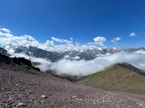 Kyrgyzstan, Ala Archa, Komsomolets Peak, incredible views of mountain peaks like the Alps in Europe, mountain climbing, clouds over rocks, slopes in clouds, wallpaper on desktop
