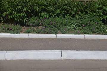 Obraz premium curb along the highway, asphalt and lawn along the road, minimalism 2