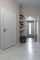Modern Bright Hallway with Built-in Shelves