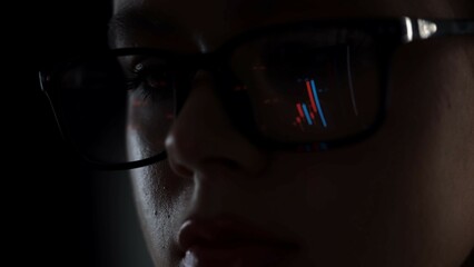 Analyzing Financial Data Reflected in Glasses Close Up View