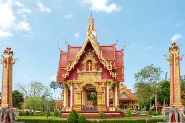 Fototapeta premium Golden Chapel at Wat Maha That Wachiramongkol (Wat Bang Thong), Phang Nga, Thailand – Ornate Thai Temple Architecture in Sacred Setting