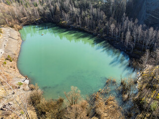 Aerial drone view of Quarry in Kozy an inactive quarry of Lgocka sandstones located on the slope of Chrobacza meadow, within the Magurka Wilkowicka group in Kozy, Polish Beskids.