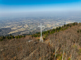 Aerial drone view of beskid mountains in spring. Chrobacz Meadow peak in the Magurka Wilkowicka Group in the Little Beskids. Cross on a mountaintop in the Beskids..