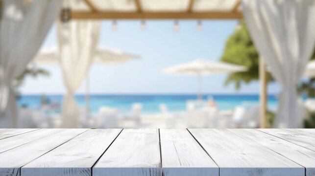 White wooden table with blurred outdoor restaurant background