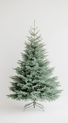 Fototapeta premium Full evergreen fir christmas tree with lush green needles standing on a metal stand against a plain white background for seasonal decoration
