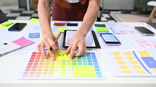 UX graphic designer planning application process development prototype wireframe for web smart phone.