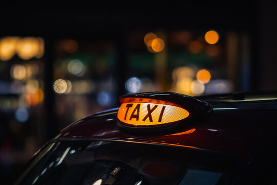 Illuminated London black cab taxi sign