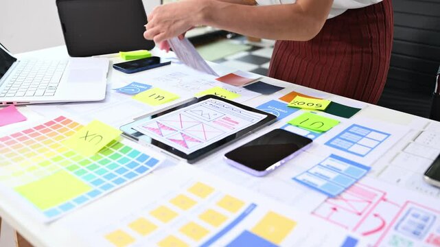 UX graphic designer planning application process development prototype wireframe for web smart phone.