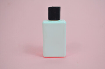 Cosmetic tube, Blank Cosmetic product branding mockup, face wash tube, cream tube Mock up isolated on pink background
