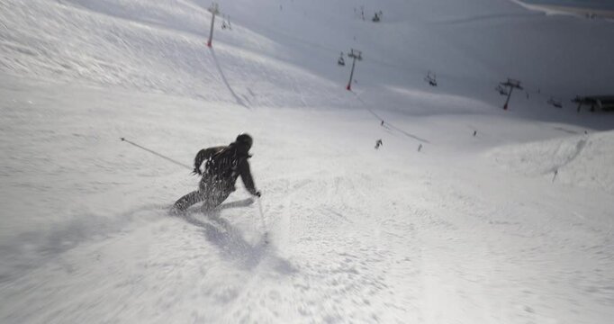 Skier fast follow action shot skiing