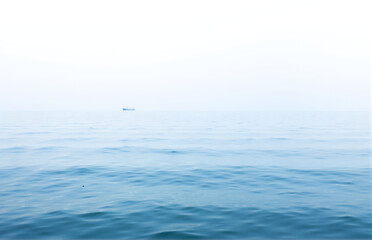 Lonely Boat on the Misty Sea