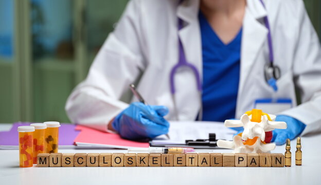 A healthcare professional examines musculoskeletal pain using tools, techniques, and medications to enhance care
