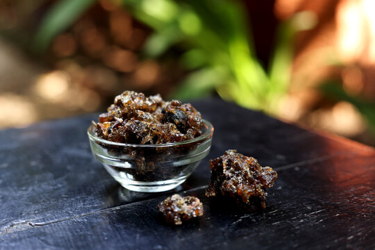 Indian Pooja Samagri  called Gugal or Gugul isolated on dark Natural background 
