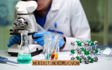 Fototapeta premium A researcher conducts multiple experiments using a powerful microscope along with various laboratory equipment