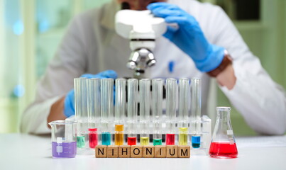 An innovative lab scene showcasing advanced Nihonium research with colorful test tubes and a powerful microscope