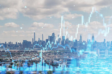 Obraz premium Manhattan skyline with holographic stock market charts overlay. Double exposure concept. Double exposure