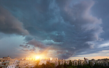 Storm Clouds Gathering Over City Skyline