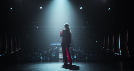 Celebrity Public Speaker Giving an Inspiring Talk at an International Business Development...