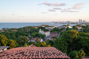 Aerial view of the historic architecture of the Brazilians cities of Olinda and Recife in the State of Pernambuco, Brazil showcasing their mix of contemporary and historic buildings.