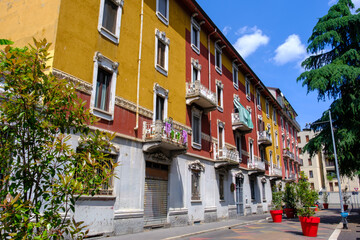 Colorful houses along via Bernardino de Conti in Milan, Italy