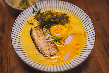 Tom Yum chashu ramen : Noodles, topped with pork belly and egg