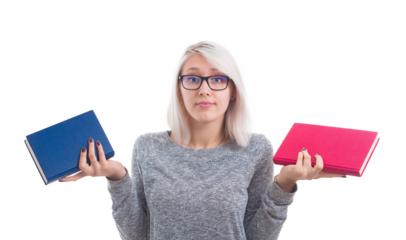 Confused student girl choosing between two books, red and blue, left or right sides. Difficult decision, educational concept, making the correct choice. Woman with eyeglasses isolated 