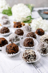 Homemade raw vegan balls Truffles with White Flowers