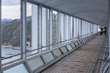 A dramatic natural scene of the Naruto Whirlpools as seen from a viewpoint near the O-naruto Bridge in Tokushima, Japan.