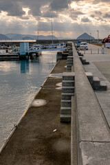 Ferry Approaching Naoshima Island during Tranquil Evening Light, Setouchi, Japan