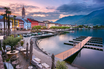 Ascona, Switzerland. Cityscape image of picturesque city of Ascona, Switzerland on the shores of Lake Maggiore at summer sunrise.