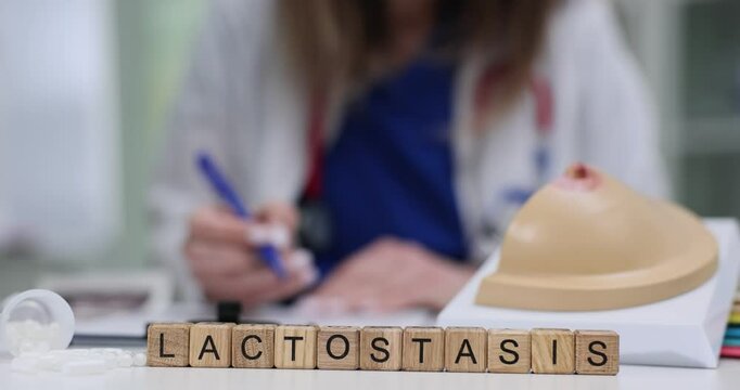 Female professional writes prescription for Lactostasis treatment near anatomical model of female breast and pills. Milk retention in mammary gland