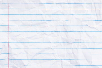 Crumbled lined loose leaf notebook paper background