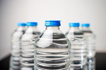 plastic water bottles on the table