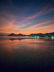 Pink sunset on beautiful beach