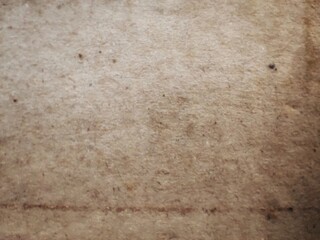 Close-Up of Cardboard Paper Texture, Showing the Natural Brown Carton Material Surface in Detail.
