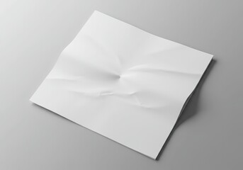 Wrinkled White Paper Sheet Isolated on Gray Surface with Shadows. Top View, Full Frame