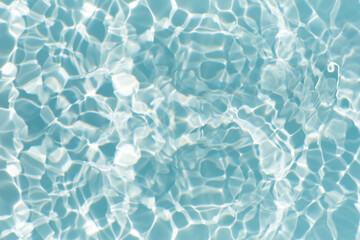 Blue water with ripples on the surface. Defocus blurred transparent blue colored clear calm water...