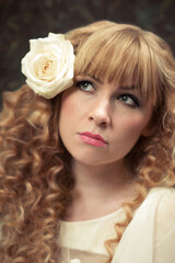 Woman With Rose In Hair