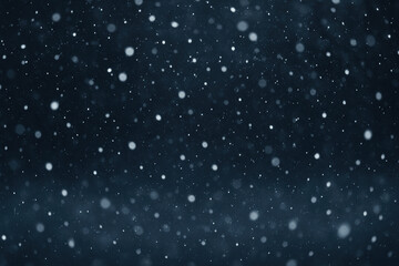 Obraz premium Snowflakes falling in front of a dark background.