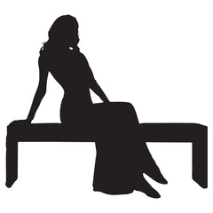 Silhouette of a woman seated, conveying elegance and stillness in a minimalist composition.