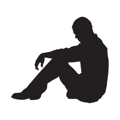 Silhouette of a seated person conveys a mood of contemplation, loneliness, or quiet reflection.