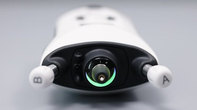 Close-up of a portable tonometer for measuring intraocular pressure. Concept of ophthalmologic diagnostics and modern approach.