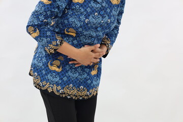 Close up of Civil servant woman having problem with her belly. Stomach ache or period concept