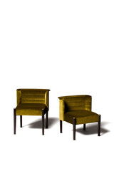 Fototapeta premium Two olive green velvet armchairs minimalist design against white background. Please see some similar pictures from my portfolio