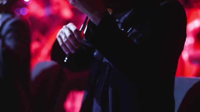 Concert view of violinist with vocalist and musical band, fiddler performing classical music, symphony orchestra performing music, violin player on stage in a club, music arena hall, fiddle and bow