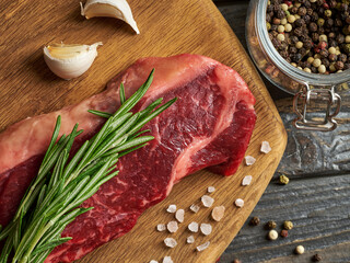 raw beef steak on the cutting desk 