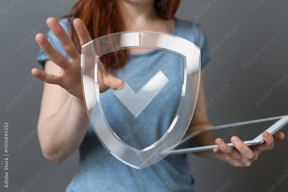 Poster Image of a woman interacting with a digital shield and checkmark, symbolizing data security and protection.